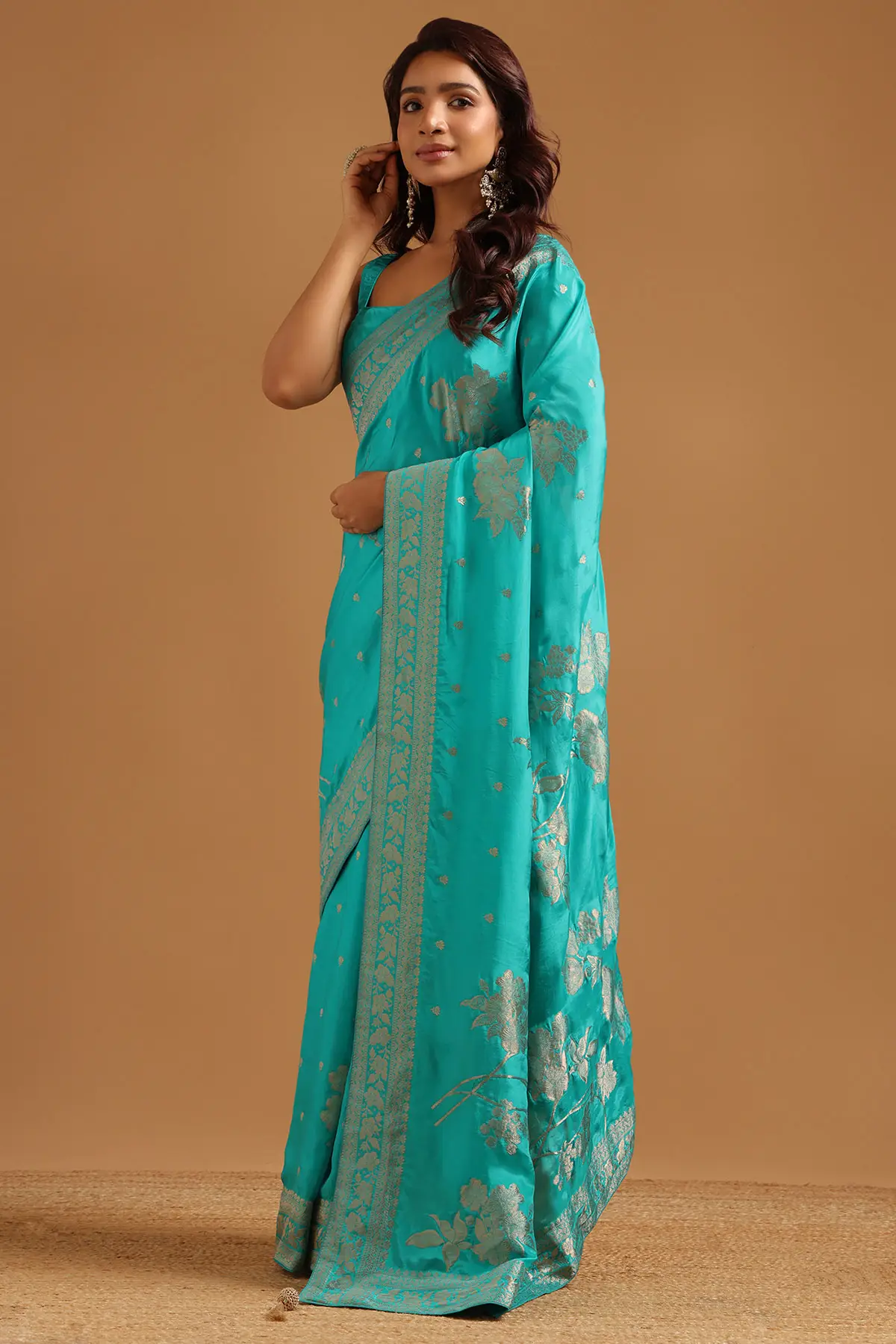 Turquoise Blue Crepe Floral Zari Woven Saree